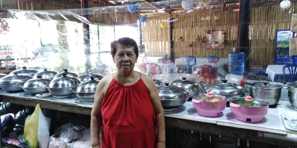 in photo: Ms. Merlita Mundin, the owner of Mundin's Eatery