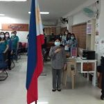DTI Quezon staff singing the National Anthem during the Flag Ceremony for the month of January 2023.