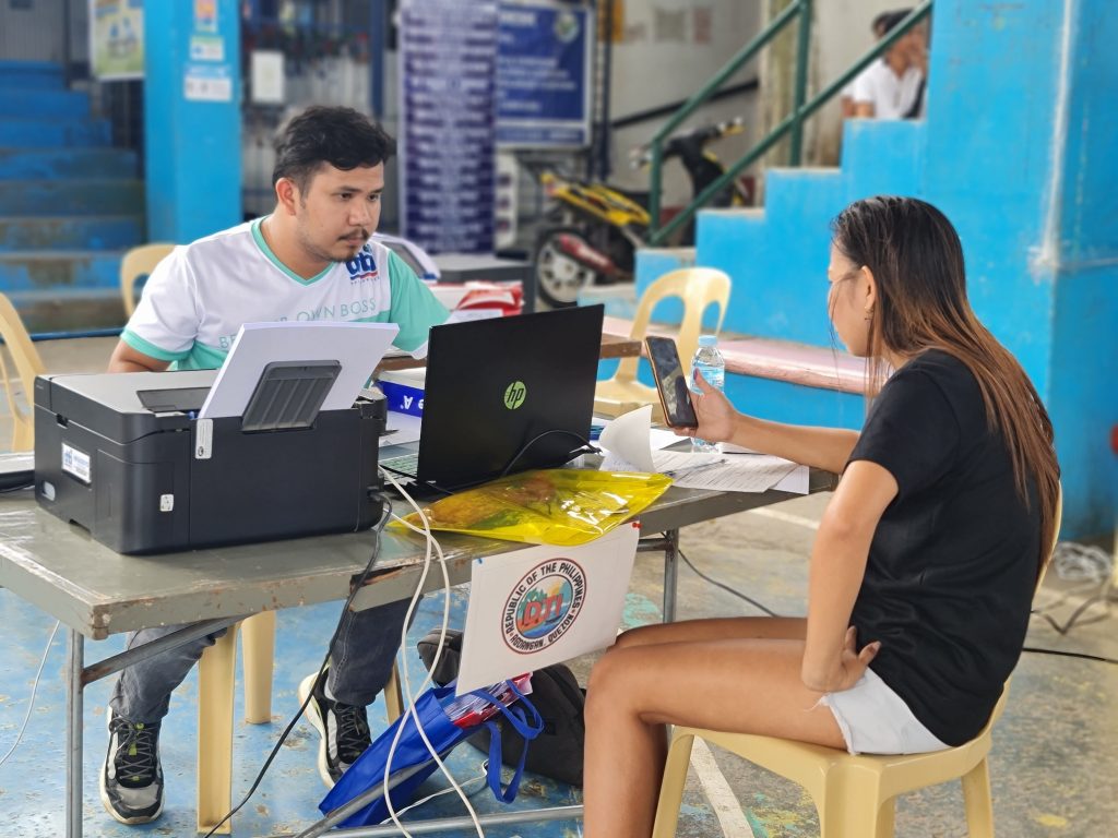 Department of Trade and Industry (DTI) through Negosyo Center Business Counselor from Agdangan, assisting client. 