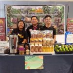 Mr. George Salinas together with children promoting Nayong Kalikasan products