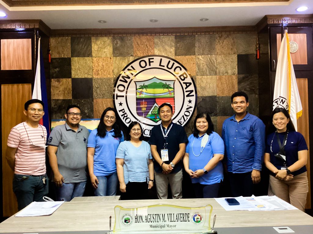 in photo: DTI Quezon represented by Business Development Division Chief, Anna Marie V. Quincina; CMCI Focal Person, Ma. Angelica O. Holgado; and Negosyo Center Business Counselor Marianne Marie Adornado, together with LGU Lucban.