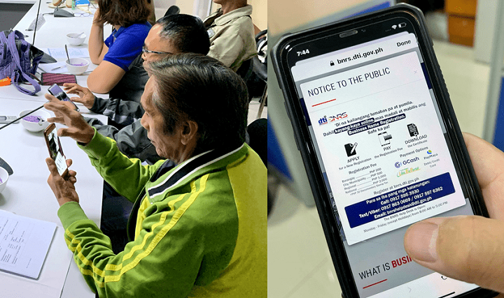 People using smartphone to transact online