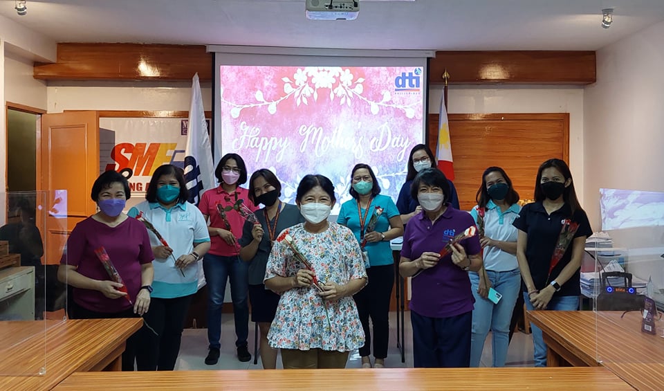 In Photo: 13 mothers in the office at DTI Quezon 