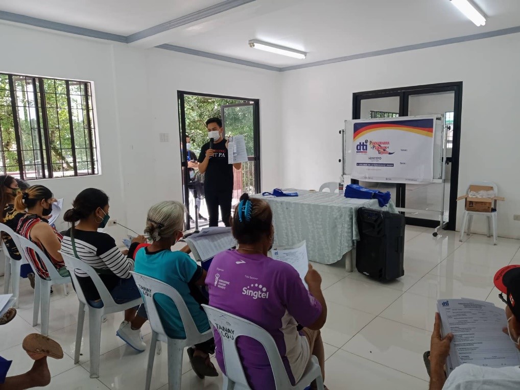 Negosyo Center Tanay (Sampaloc) Business Counselor, Mr. Aryan Llamares discussing the different programs and services of DTI.