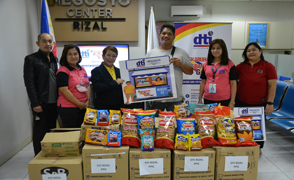 DTI Rizal together with one of the beneficiaries of PPG livelihood kit.