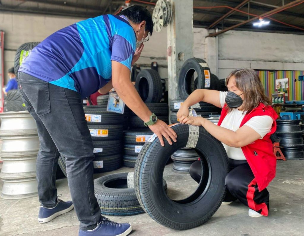 Consumer Protection Group (CPG) Assistant Secretary Atty. Ann Claire C. Cabochan sealing an uncertified tire for automotive vehicles in Quezon City, 26 October 2022.