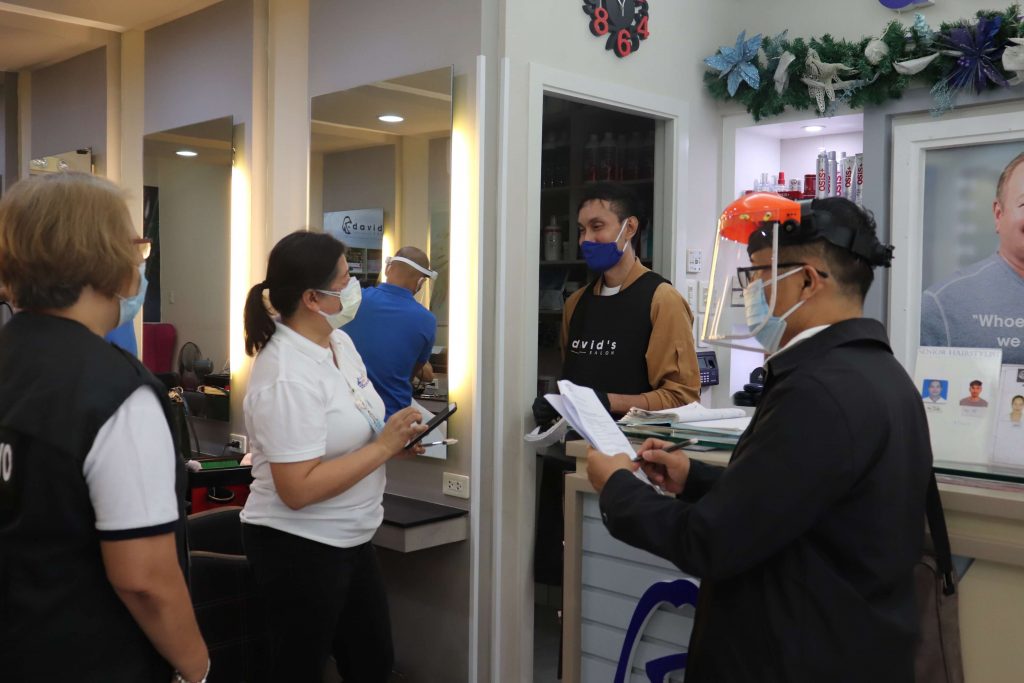 (L-R):  DTI Samar OIC Lily Larraga, DTI Leyte OIC Badette Corsiga, Senior Staff of David's Salon, and DTI Biliran OIC Jojo Gayas coducts monitoring in one of the salons in Robinsons North