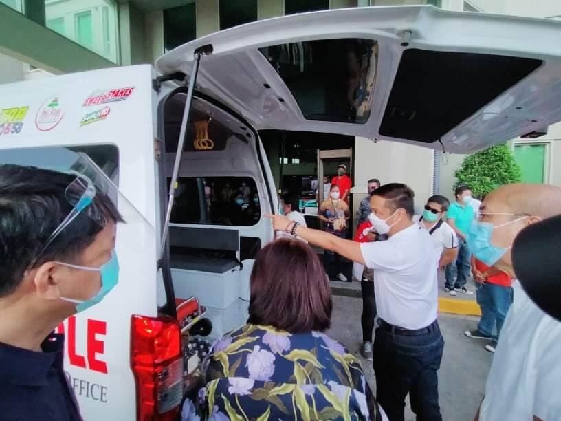 Dave M. Almarinez of the Philippine International Trading Corporation (PITC)  receives donation of a new patient transport vehicle (PTV)