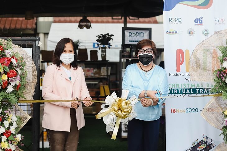 ARD Gay Tidalgo and PD Brenda Corvera cut the ribbon officially marking the launch of PISTA Christmas Bazaar Virtual Trade Fair.
