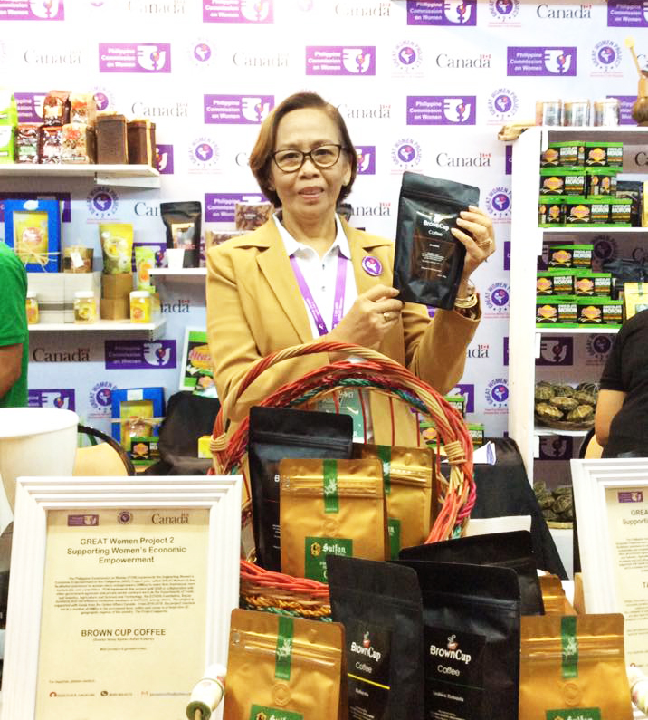 Rebecca Gacayan holding her coffee products