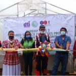 DTI-10 OIC-Regional Director joins the official ribbon cutting of the coffee postharvest facility in Pangantucan, Bukidnon.