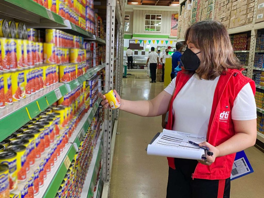 Consumer Protection Group (CPG) Assistant Secretary Atty. Ann Claire C. Cabochan inspecting the canned good section of a firm in Quezon City, 26 October 2022.